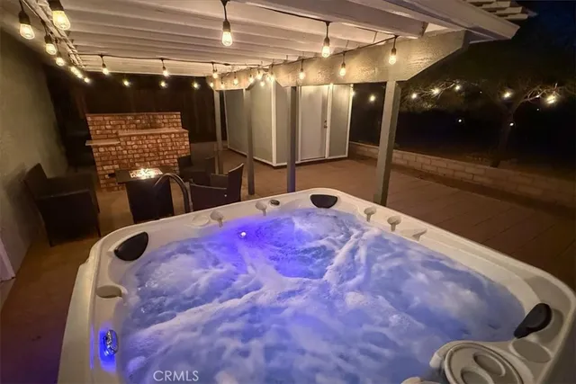 a view of a garden with a building in the background