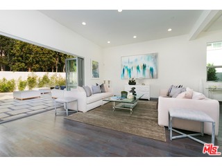 12263 Renfrew Road Los Angeles, CA 90049 - Photo 11 of 42 a living room with furniture and a large window