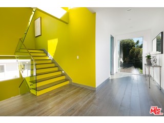 12263 Renfrew Road Los Angeles, CA 90049 - Photo 16 of 42 a view of entryway and hall with wooden floor