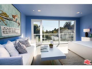 12263 Renfrew Road Los Angeles, CA 90049 - Photo 21 of 42 a living room with furniture and a large window
