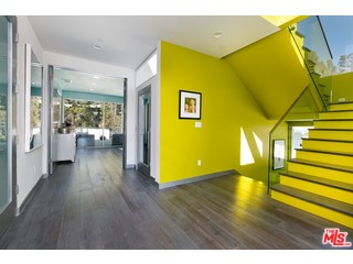 12263 Renfrew Road Los Angeles, CA 90049 - Photo 23 of 42 a view of a living room with a wooden floor