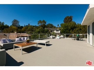12263 Renfrew Road Los Angeles, CA 90049 - Photo 33 of 42 a view of outdoor space swimming pool and lounge chair