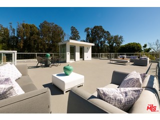 12263 Renfrew Road Los Angeles, CA 90049 - Photo 34 of 42 a view of a terrace with couches and sky view
