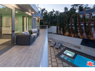 12263 Renfrew Road Los Angeles, CA 90049 - Photo 37 of 42 a view of living room and wooden floor