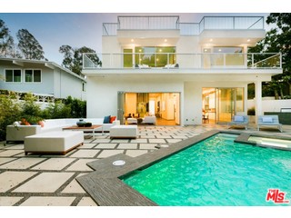 12263 Renfrew Road Los Angeles, CA 90049 - Photo 42 of 42 a view of an house with backyard outdoor seating and kitchen view