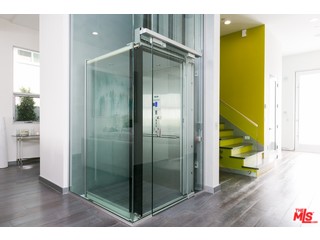 12263 Renfrew Road Los Angeles, CA 90049 - Photo 7 of 42 a bathroom with a shower and a sink