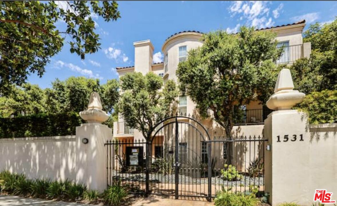 1531 12th Street, Unit 1 Santa Monica, CA 90401 - Photo 1 of 21 a front view of a house with a garden