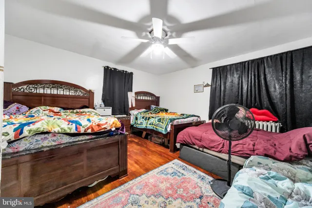 a bedroom with bed and window