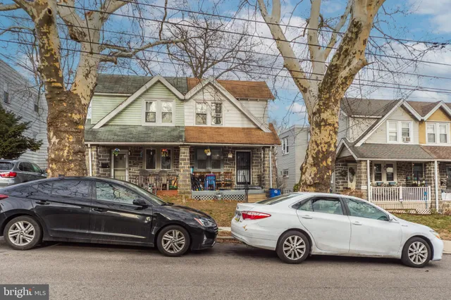 a car parked in front of a house