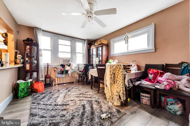 a bed room with furniture and a window