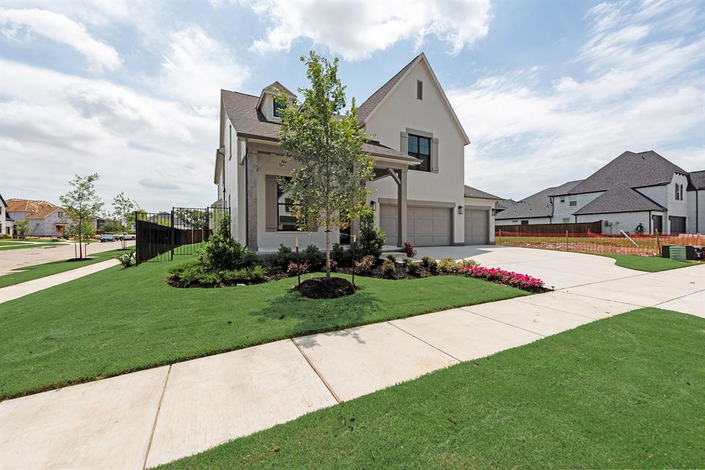 16396 Parish Lane Frisco, TX 75033 - Photo 3 of 35 a front view of house with yard and green space