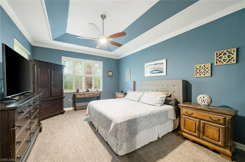 a view of a patio with a table and chairs