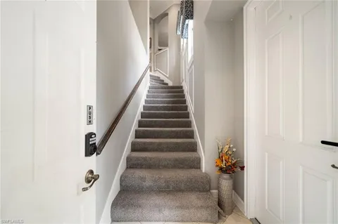 a view of a lake with a building in the background