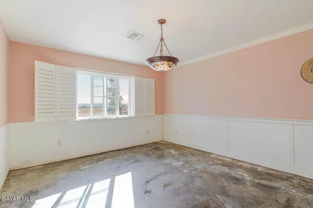 a view of a room with a chandelier