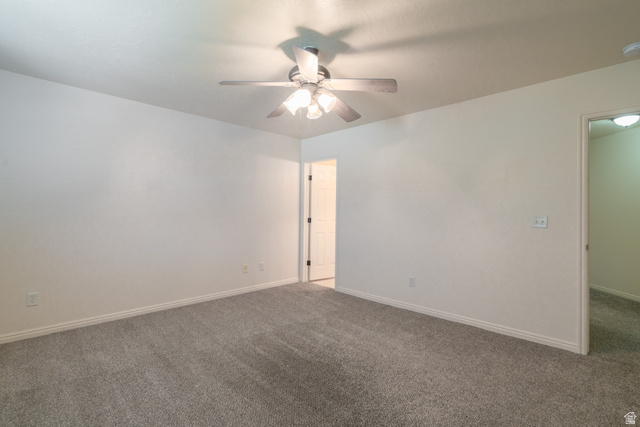 1735 West 540 North, Unit 1805 St. George, UT 84770 - Photo 44 of 64 Spacious interior room featuring light gray carpeting, white painted walls, white baseboards, and a ceiling fan with integrated lighting