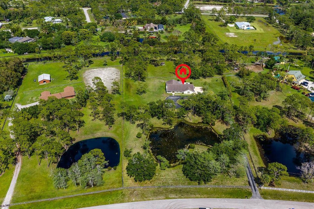 5562 Reynolds Road Lake Worth, FL 33449 - Photo 2 of 39 a view of a garden
