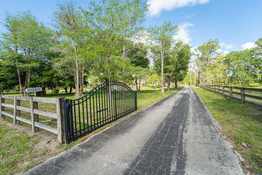 5562 Reynolds Road Lake Worth, FL 33449 - Photo 36 of 39 a view of a park with large trees