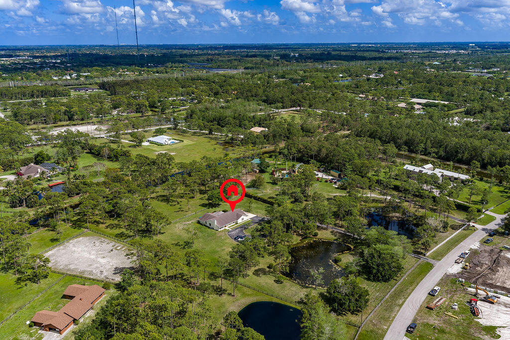 5562 Reynolds Road Lake Worth, FL 33449 - Photo 38 of 39 a view of a lush green field