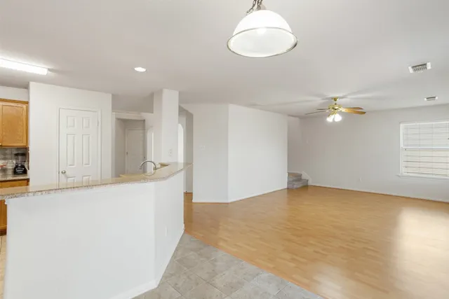 a view of kitchen and sink