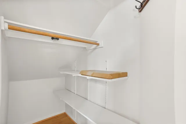 a view of a deck with wooden floor and seating space