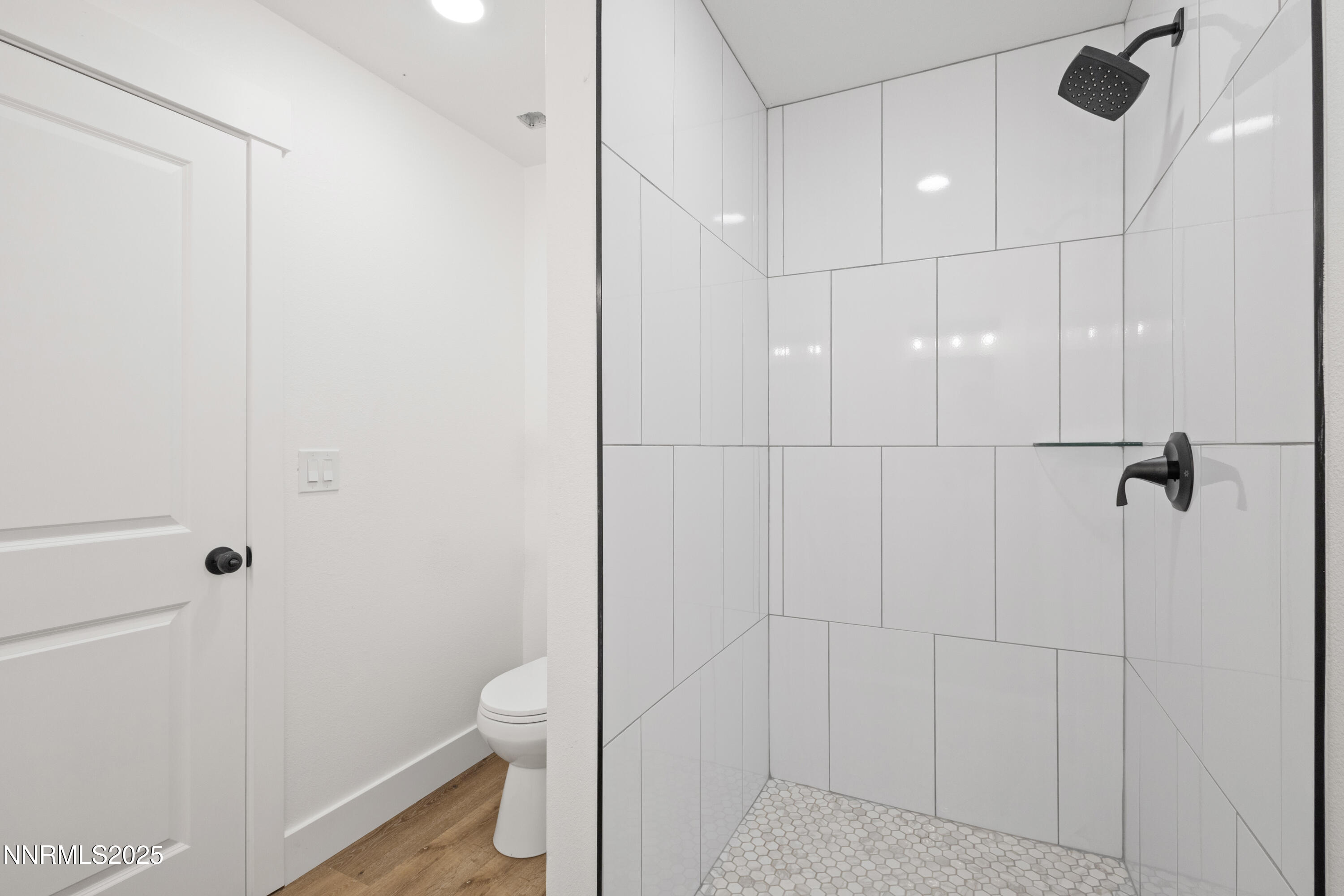 10835 Silver Knolls Boulevard Reno, NV 89508 - Photo 26 of 43 a bathroom that has a toilet a sink and a shower