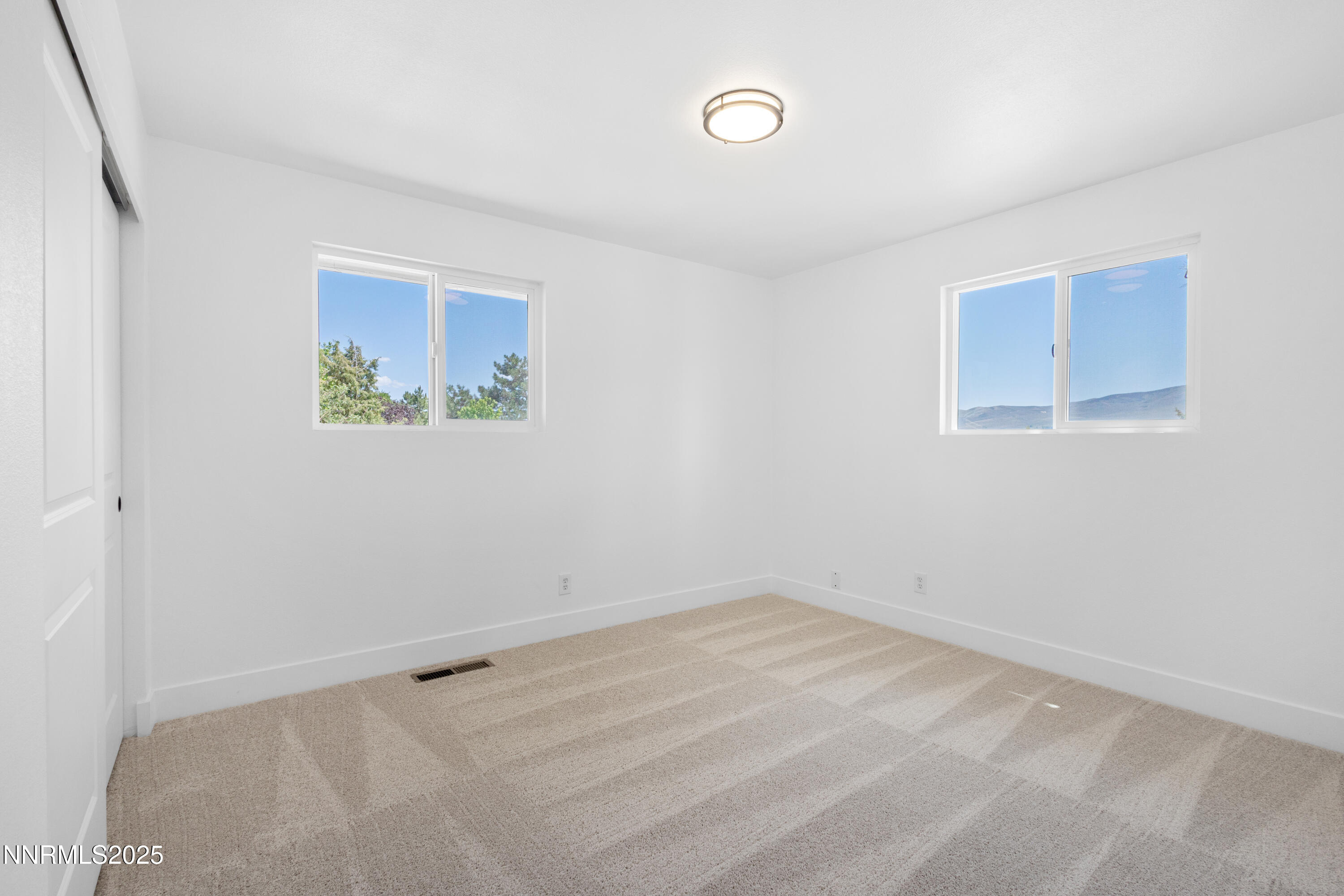 10835 Silver Knolls Boulevard Reno, NV 89508 - Photo 28 of 43 a view of an empty room with a window