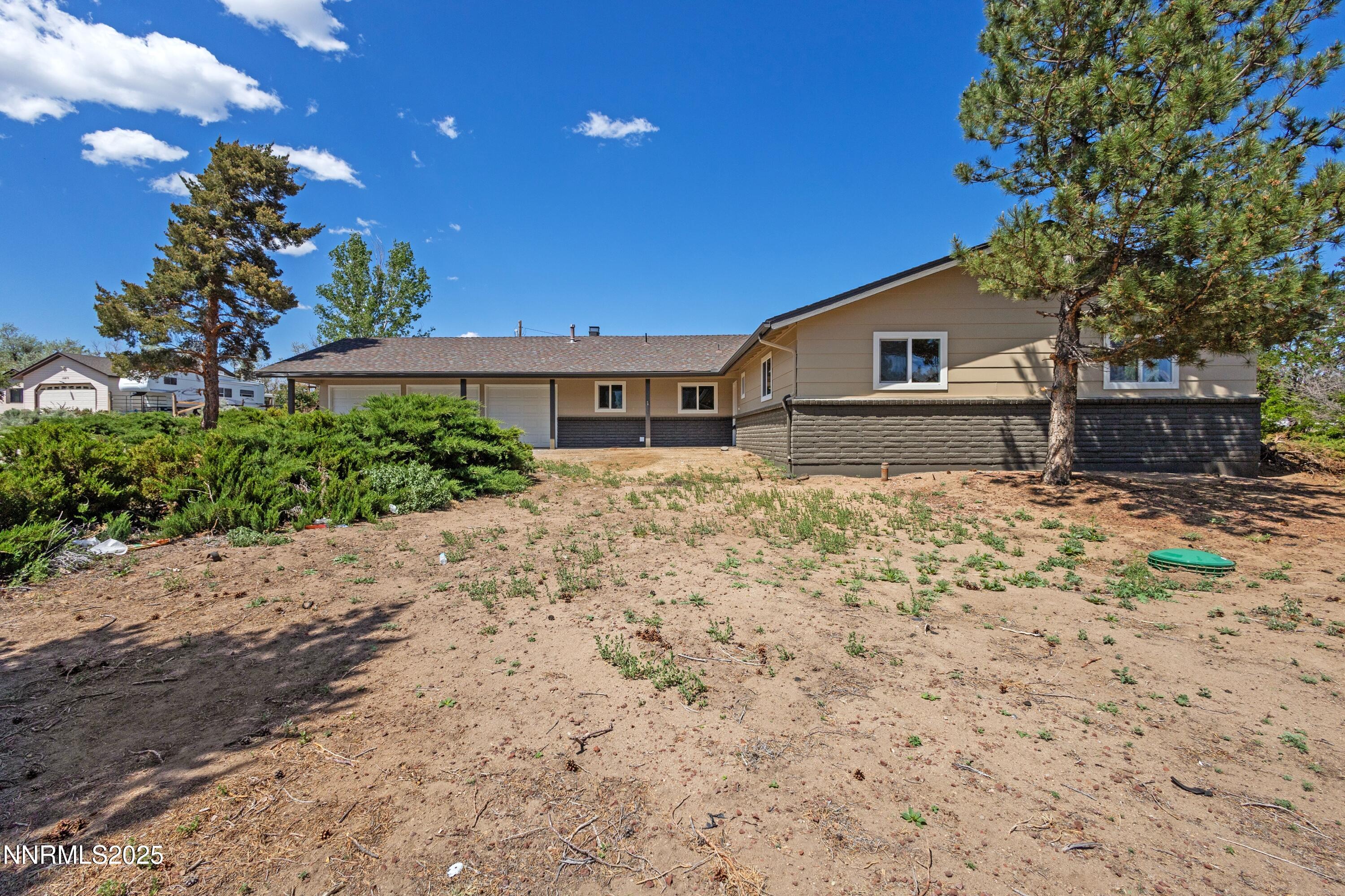 10835 Silver Knolls Boulevard Reno, NV 89508 - Photo 4 of 43 a house view with a outdoor space