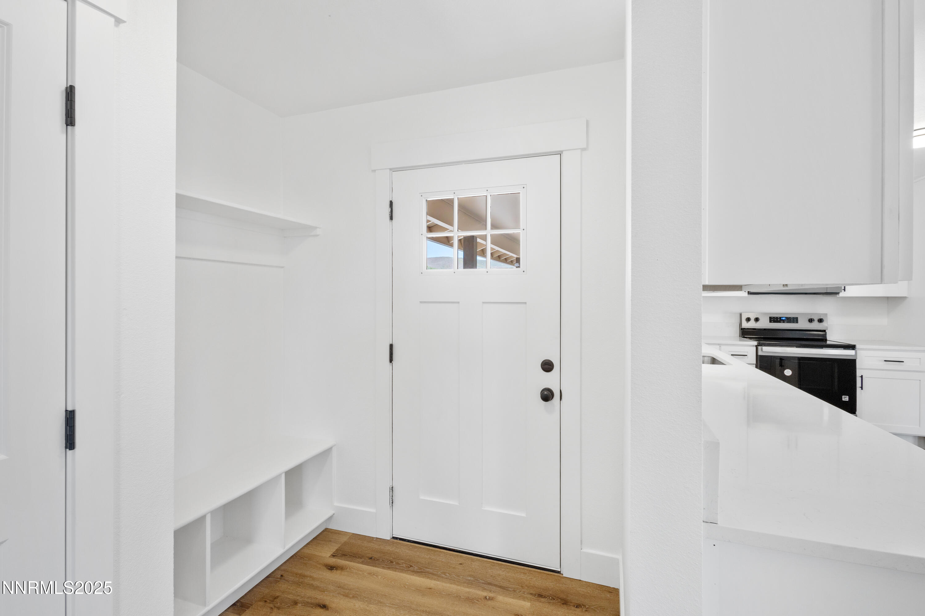 10835 Silver Knolls Boulevard Reno, NV 89508 - Photo 7 of 43 a view of kitchen with wooden floor