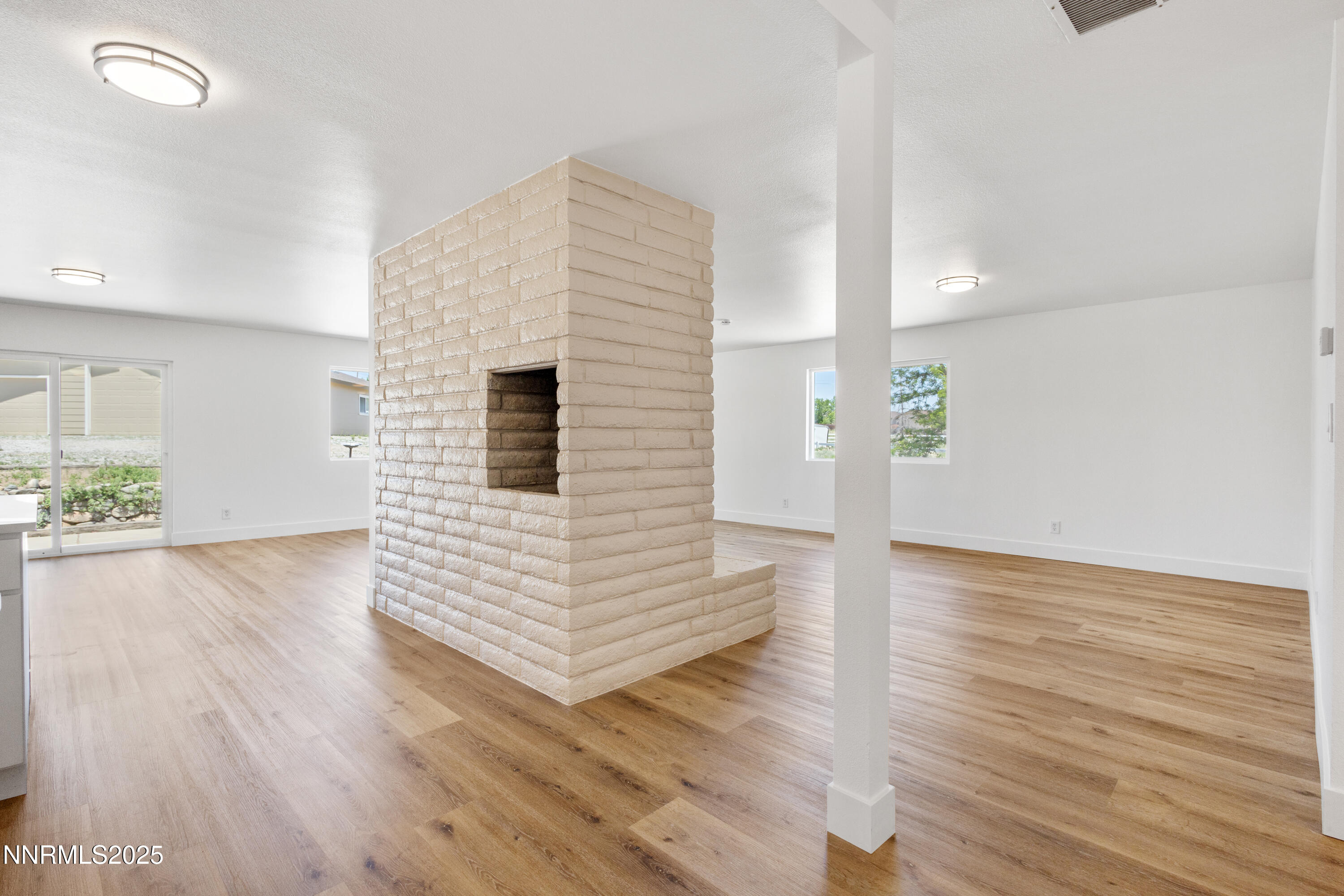 10835 Silver Knolls Boulevard Reno, NV 89508 - Photo 8 of 43 a view of a livingroom with wooden floor