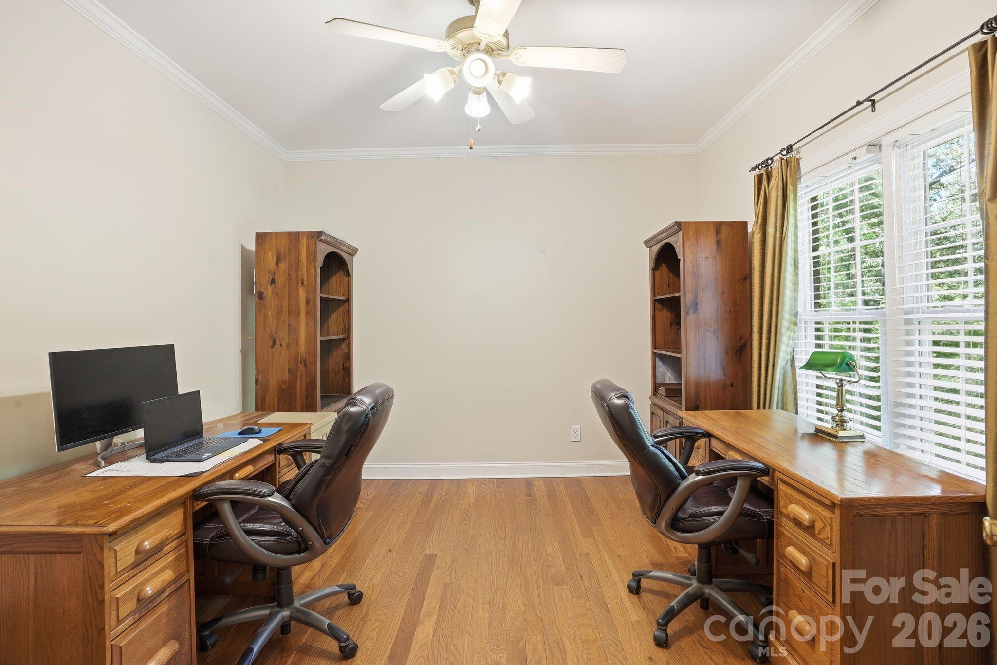 2275 River Road Richfield, NC 28137 - Photo 11 of 44 a view of a workspace with furniture and a window