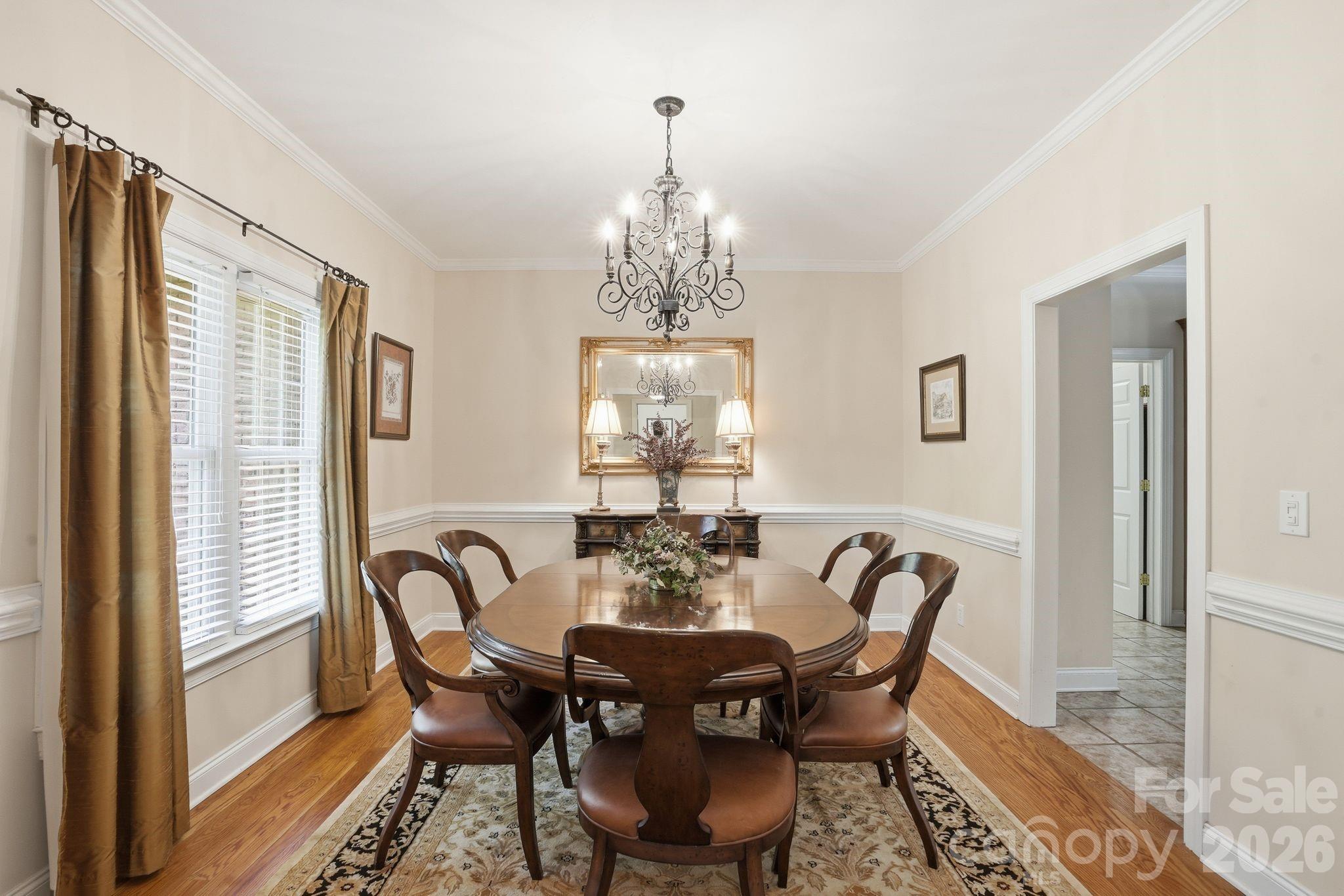 2275 River Road Richfield, NC 28137 - Photo 18 of 44 a view of a dining room with furniture window and wooden floor