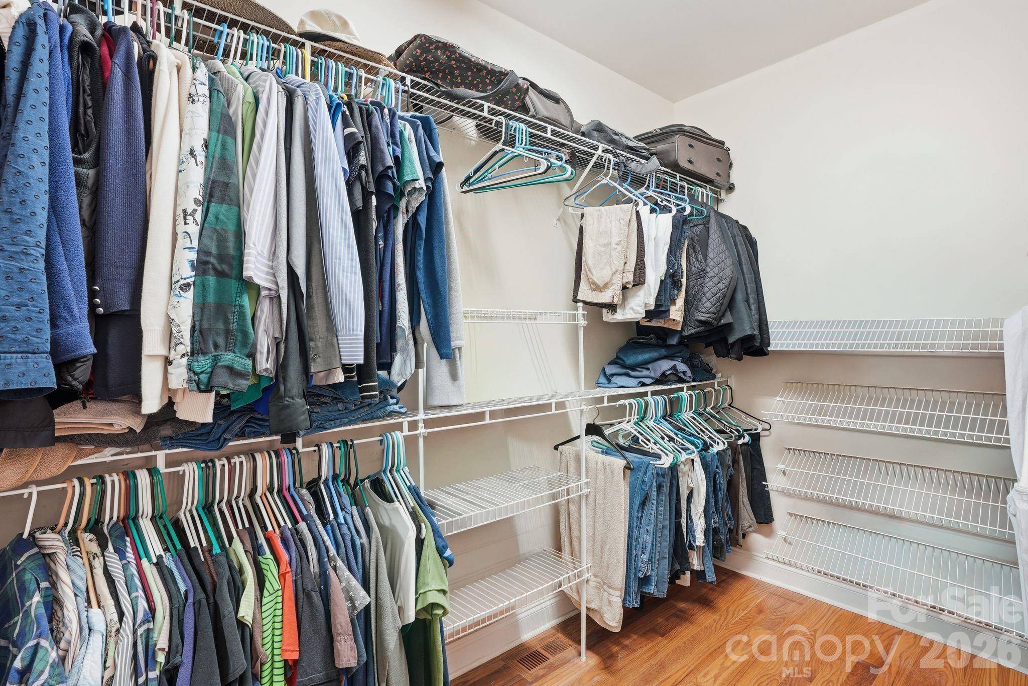 2275 River Road Richfield, NC 28137 - Photo 22 of 44 a view of walk in closet with clothes