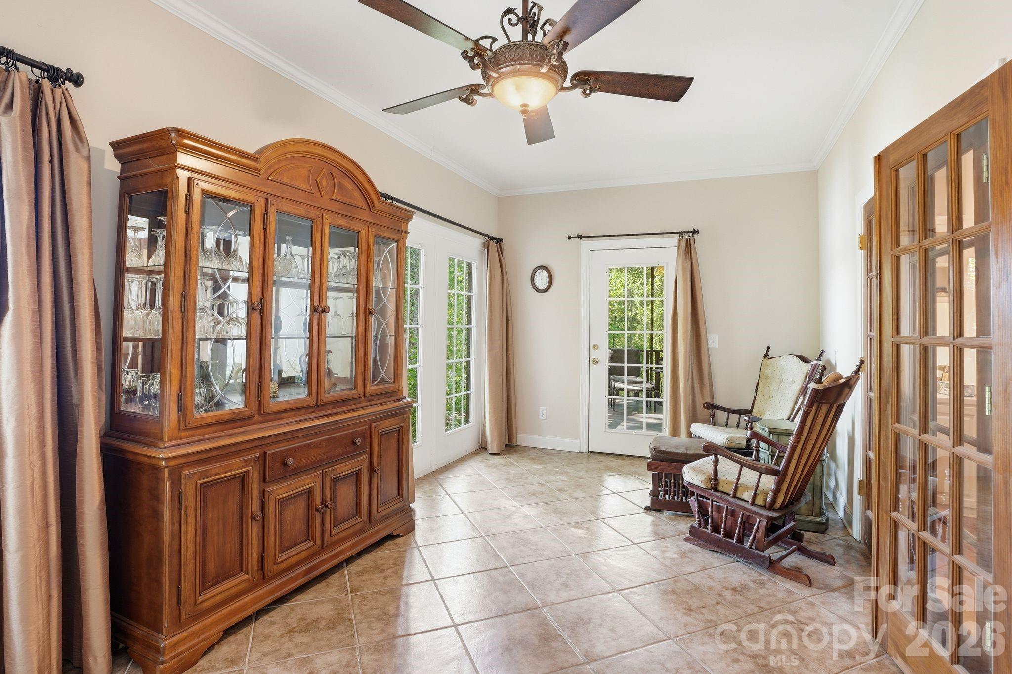 2275 River Road Richfield, NC 28137 - Photo 30 of 44 a living room with furniture a flat screen tv and a window
