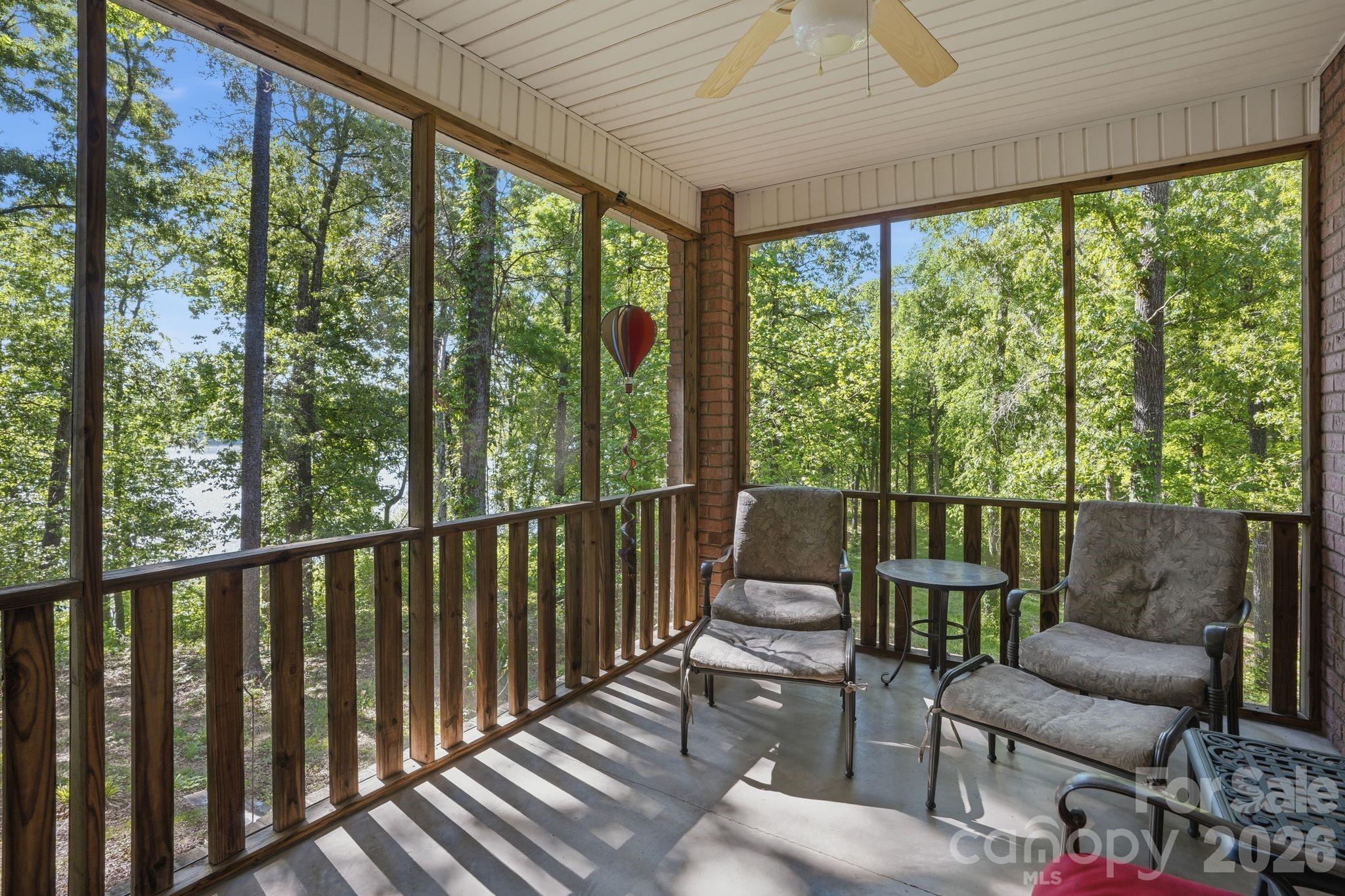 2275 River Road Richfield, NC 28137 - Photo 39 of 44 a balcony with furniture and wooden floor