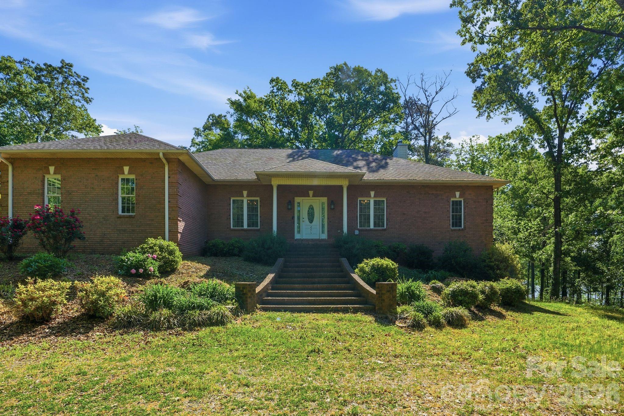 2275 River Road Richfield, NC 28137 - Photo 9 of 44 front view of a house with yard