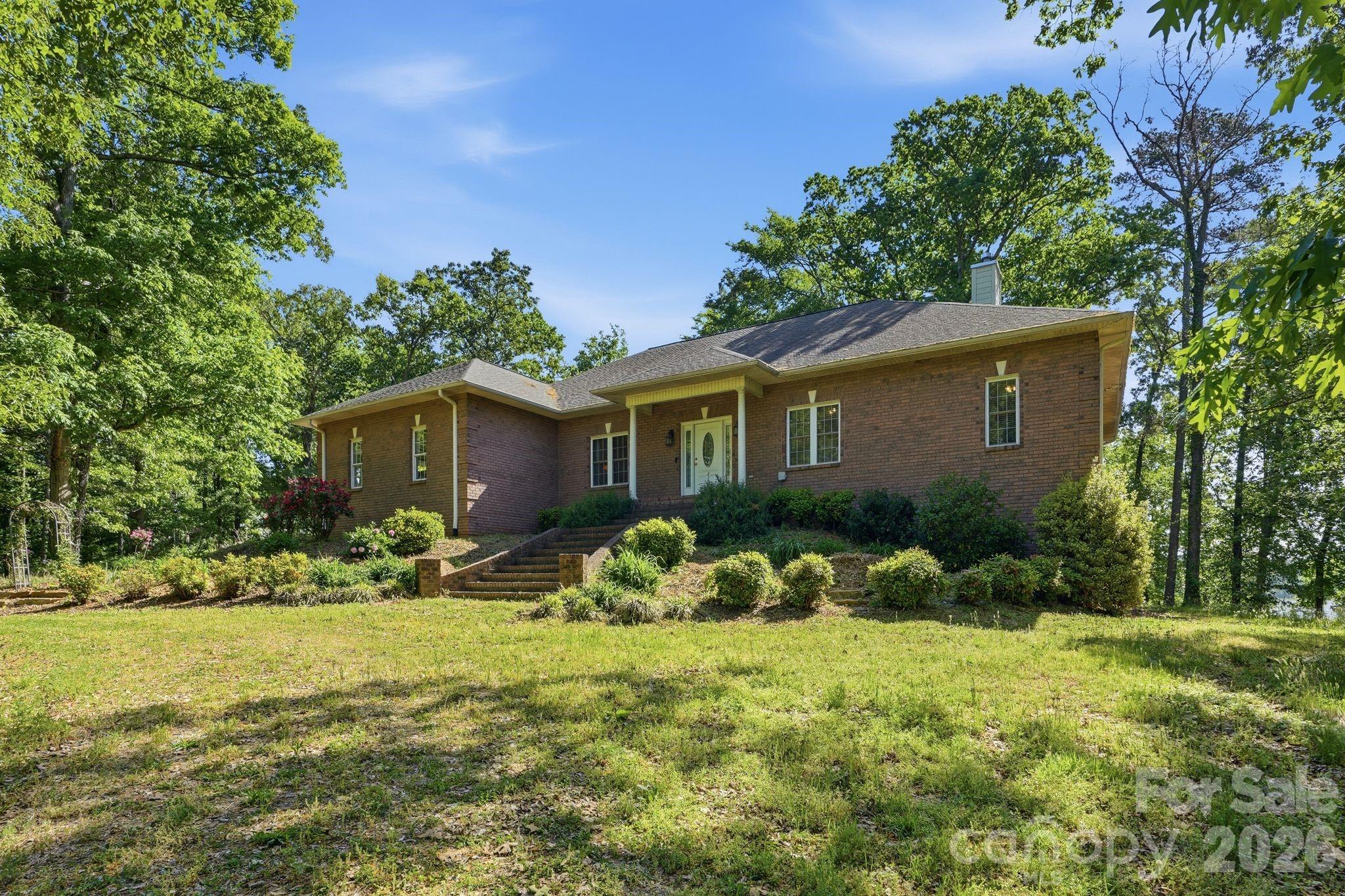2275 River Road Richfield, NC 28137 - Photo 10 of 44 a front view of house with yard and green space