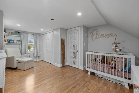 a view of livingroom with furniture and hardwood floor