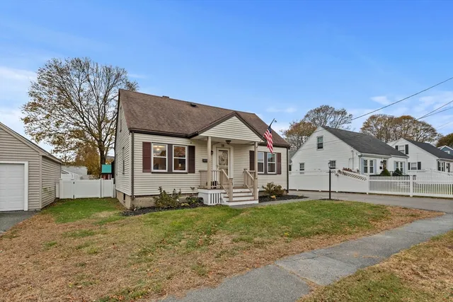 a view of house with yard