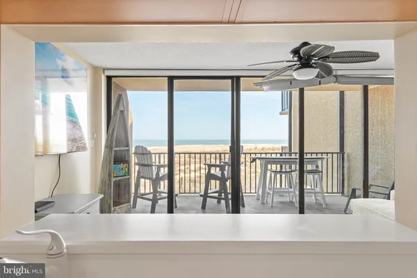 a view of a balcony with a chandelier