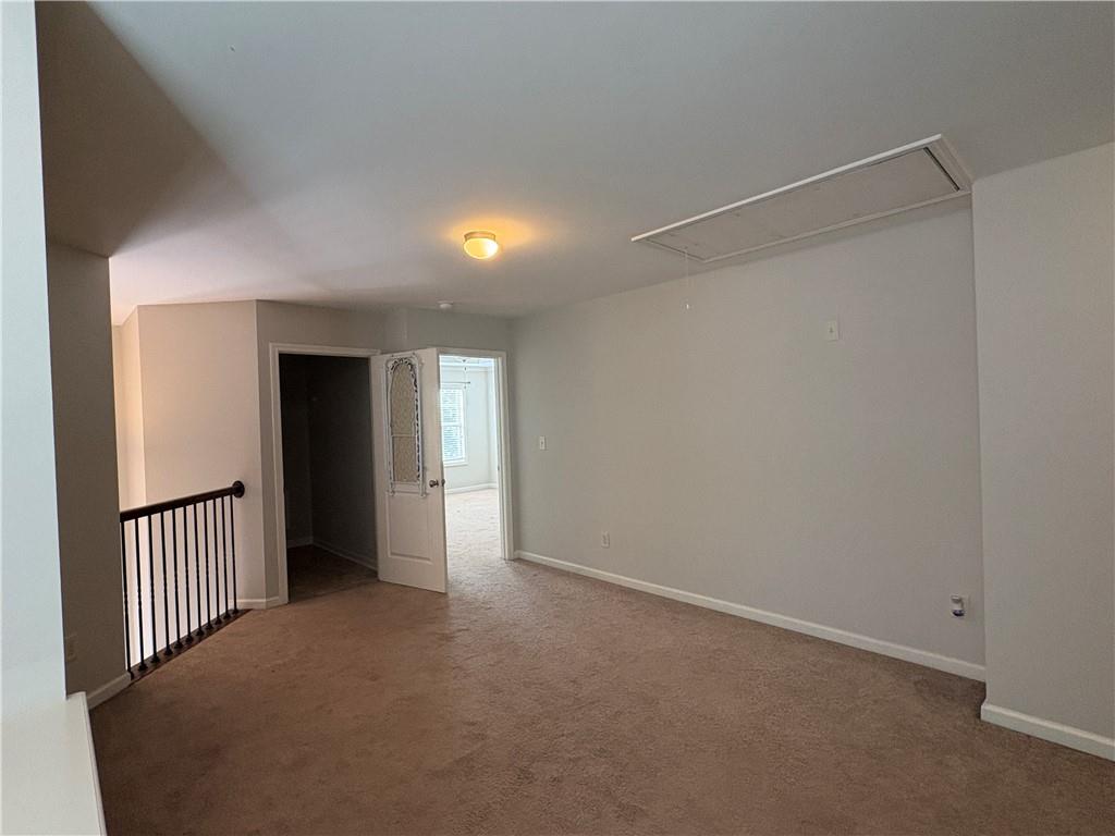 5934 Watersdown Way Flowery Branch, GA 30542 - Photo 13 of 28 a view of an empty room