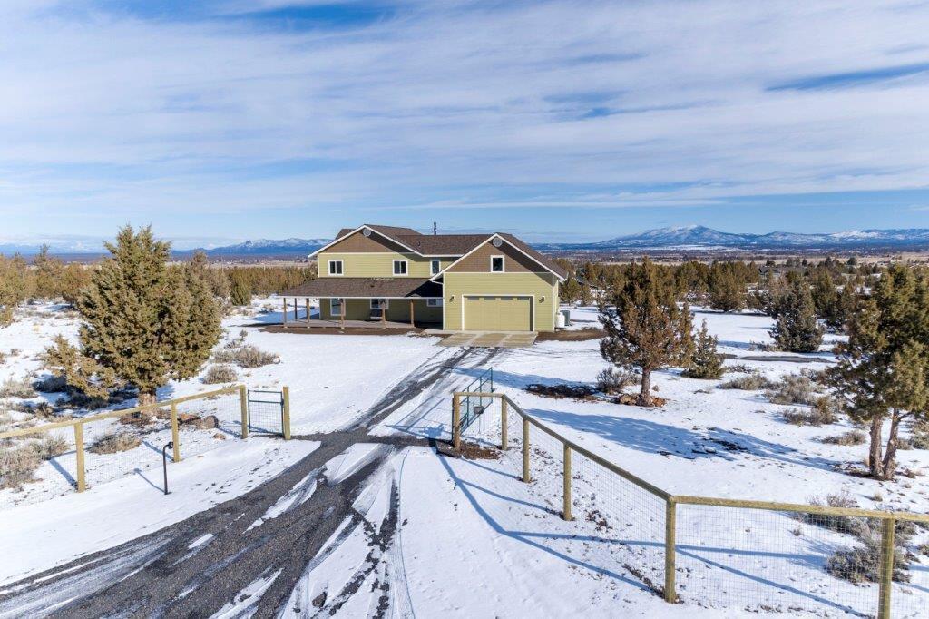 8962 Southwest Copley Road Powell Butte, OR 97753 - Photo 1 of 46 Gated entry with key pad on the south side of property