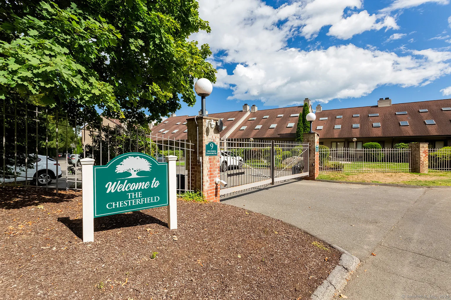 a view of a park with welcome board