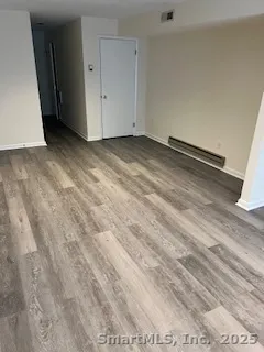 a view of a room with an empty space