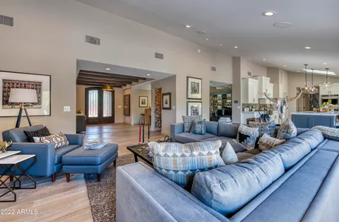 a living room with furniture and a table