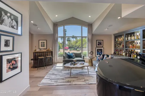 a sink with a vanity and mirror