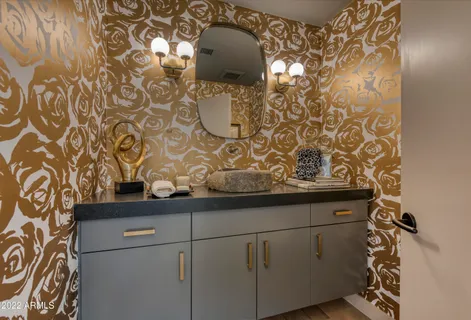 a bedroom with a large bed and a large window