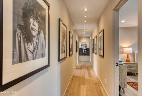 a bath tub sitting in a bathroom next to a window