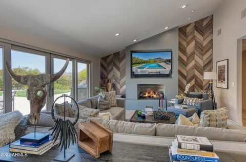 a kitchen with a dining table and chairs
