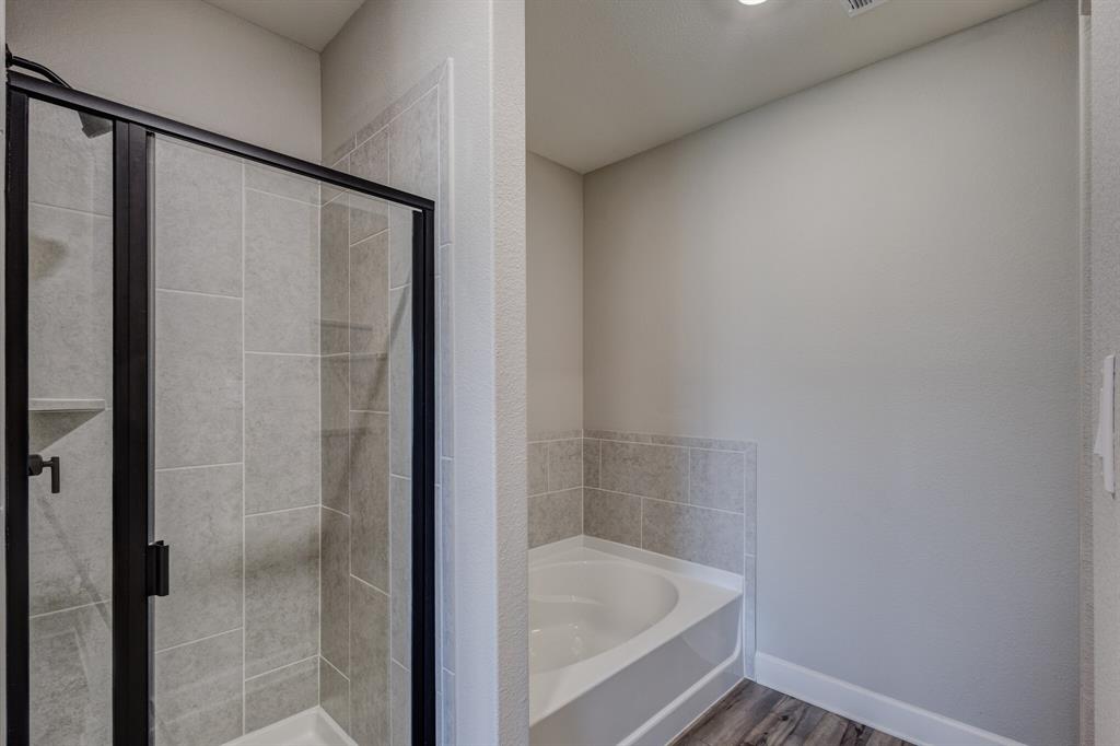 1816 Jeanine Drive Anna, TX 75409 - Photo 13 of 23 a bathroom with a bathtub