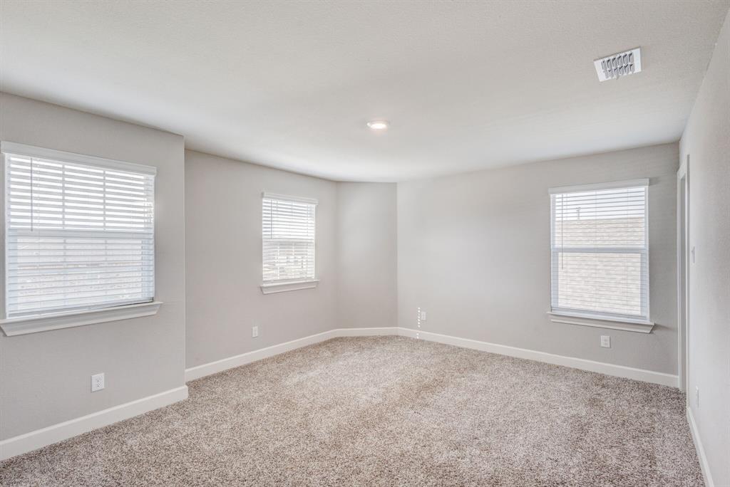 1816 Jeanine Drive Anna, TX 75409 - Photo 19 of 23 an empty room with windows